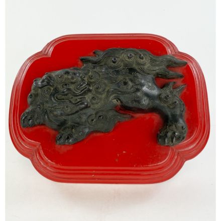 Pho Dog in bronze on a red wooden base