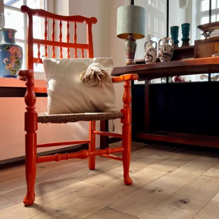 Orange lacquered armchair