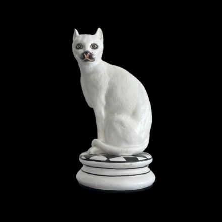 Green eyed ceramic cat