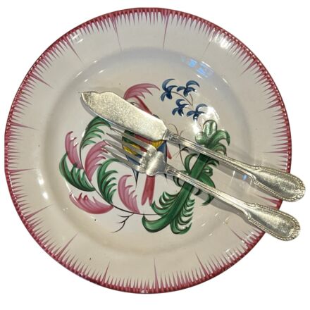 Faience de l' Est plate with bird